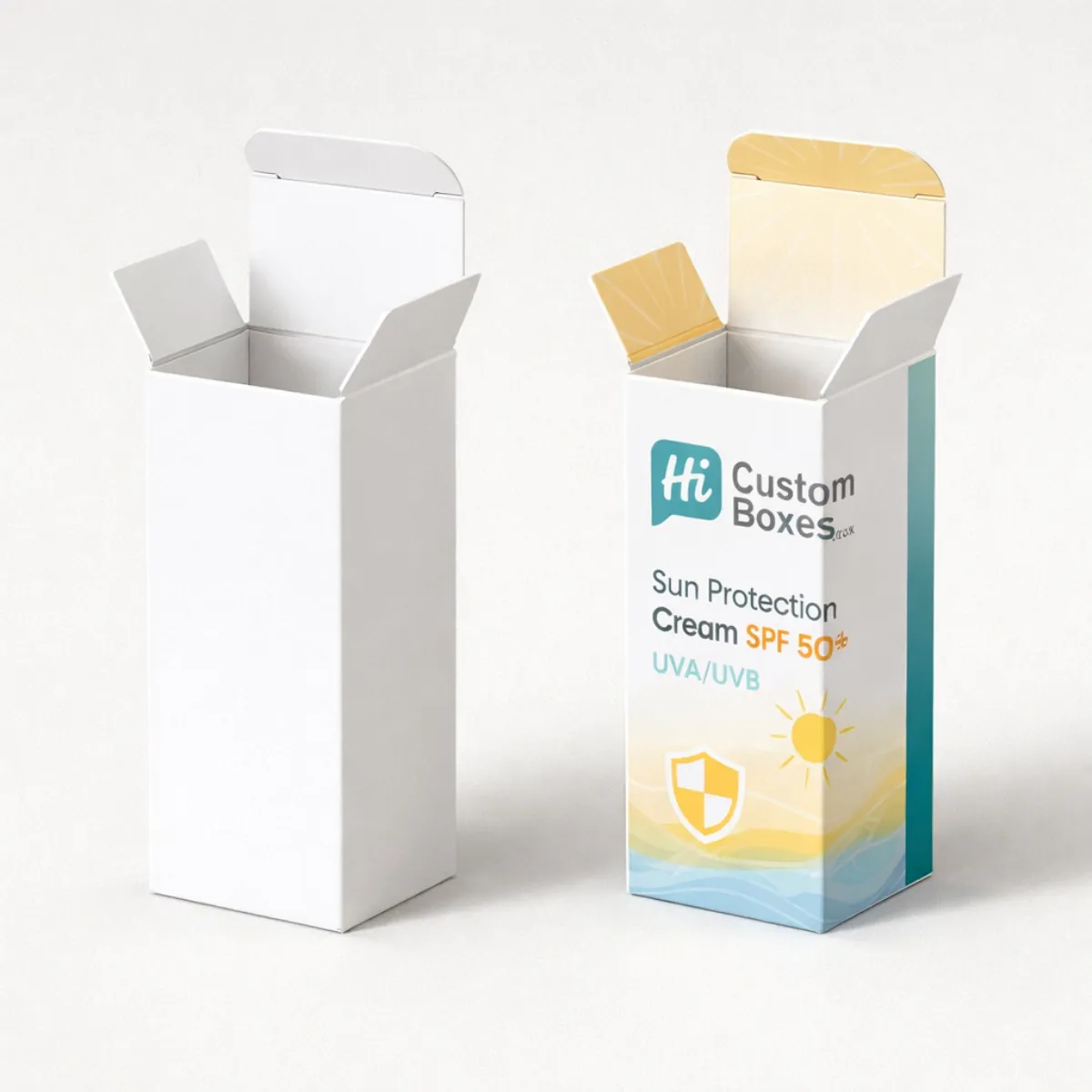 Two upright tuck-end boxes- showing a plain white sample and a branded SPF 50- design-